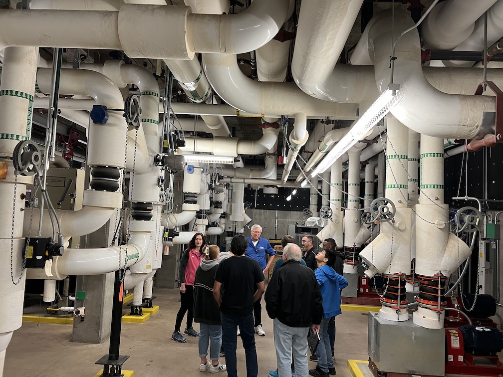 GSL ITS Chief shows students the cooling system for HPC